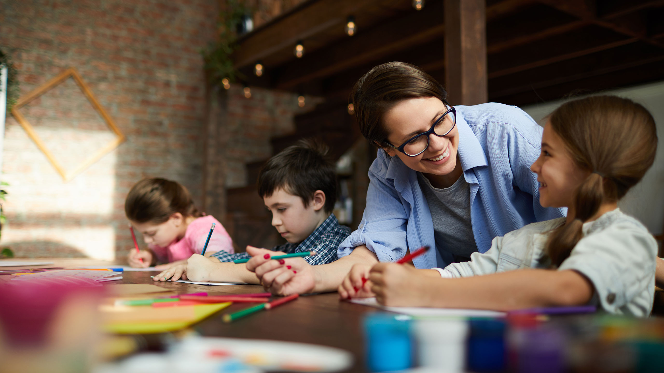 Teacher with Children in Art Class