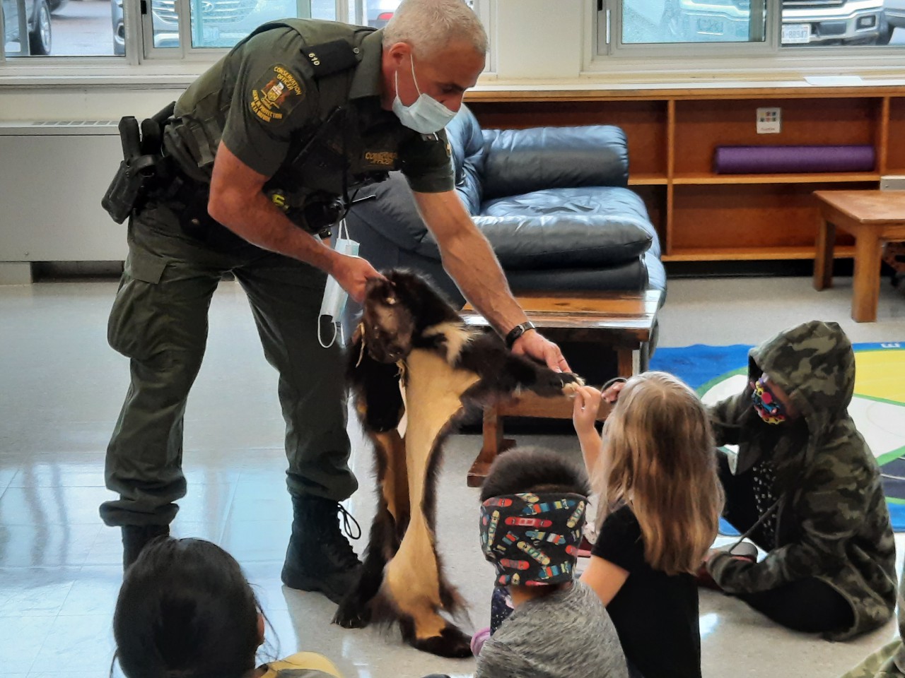 MNR Conservation Officer with pelts