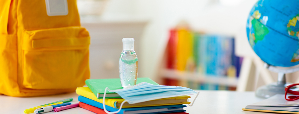 Sanitizer and mask in school