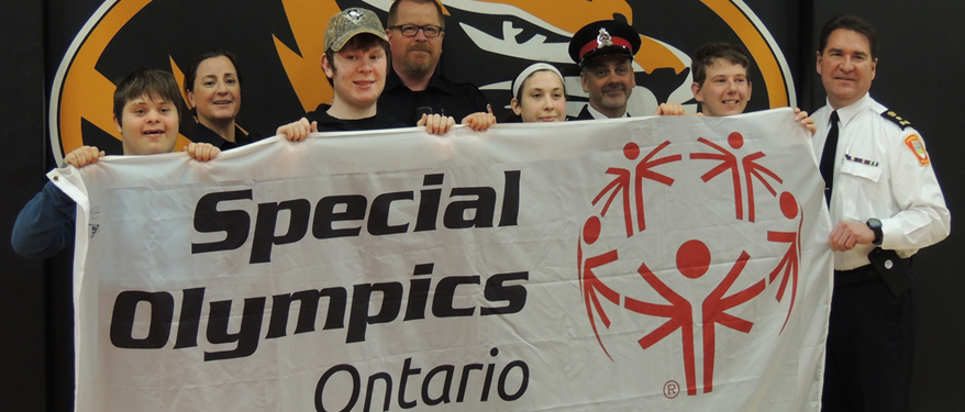 Raising the Special Olympics Flag